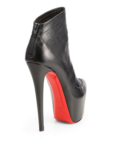 Louboutin heel boots